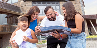 Family sharing a photo from their visit